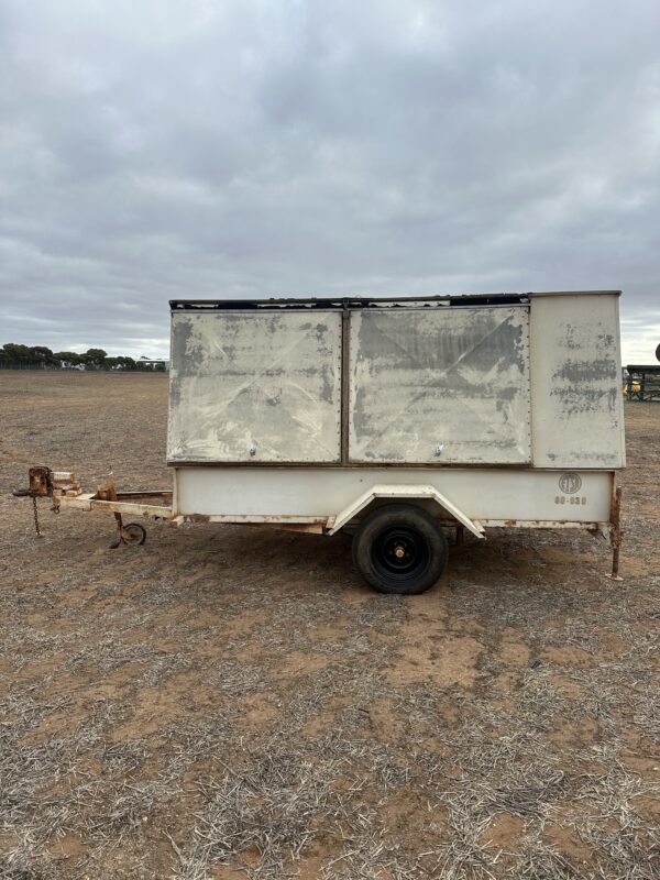 Treg Tradesman Trailer. Two seperate compartments with four doors.